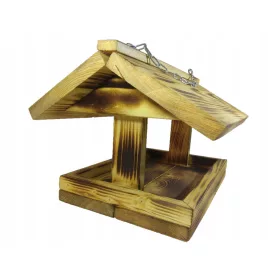    Голяма дървена хранилка за птици. Уволнен